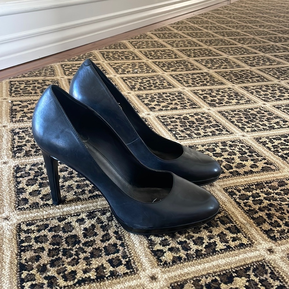 BCBG almond toe leather heels